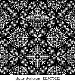 Black and white seamless pattern of dotted flowers, snowflakes, stars in trellis. Mosaic floral print of white dots. Geometric lattice print of beads. Vector Illustration.