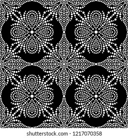 Black and white seamless pattern of dotted flowers, snowflakes, stars in trellis. Mosaic floral print of white dots. Geometric lattice print of beads. Vector Illustration.