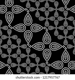 Black and white seamless pattern of dotted flowers, petals, leaves. Mosaic  background of garlands. Ethnic Textile background. Geometric zigzag print. Vector Illustration