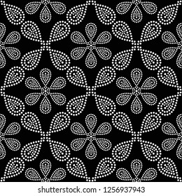 Black and white seamless pattern of dotted flowers and petals in trellis. Mosaic floral print of white dots. Geometric lattice print of beads. Vector Illustration.