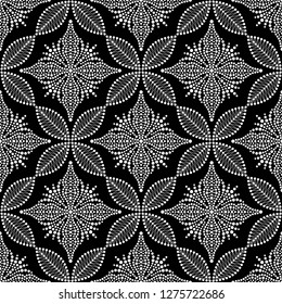 Black and white seamless pattern of dotted flowers, leaves, snowflakes, stars in trellis. Mosaic floral print of white dots. Geometric lattice print of beads. Vector Illustration.