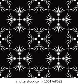 Black and white seamless pattern of dotted flowers in trellis. Mosaic floral print of white dots. Delicate lace print of beads. Vector Illustration.