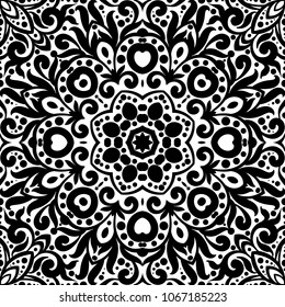Black and white seamless pattern with flourishes, monochrome intricate background. Tribal ethnic ornament, decorative repeating texture endless tile, eastern exquisite style wallpaper or texture.