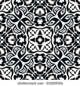 Black and white seamless pattern, hand drawn abstract background. Geometric floral ornament, tribal ethnic arabic indian motif. 