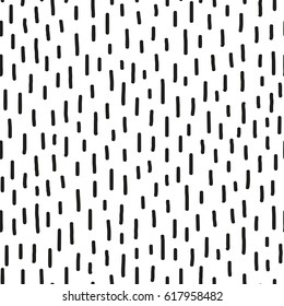 Black and white seamless pattern with hand drawn strokes.