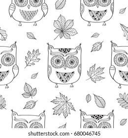 Black and white seamless pattern. Hand drawn cute owls with autumn leaves for textile, wallpapers, gift wrap and scrapbook. Doodles, sketch for your design.  Vector illustration.