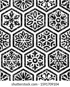 Black and white seamless pattern. Black hexagon tiles on a white background. Vintage ornament drawn by brush on paper. Print for textiles, carpets, packaging. Vector illustration.