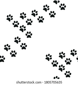 Black and white seamless pattern with paw prints. Abstract background, animal footprint