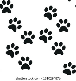 Black and white seamless pattern with paw prints. Abstract background, animal footprint
