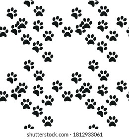 Black and white seamless pattern with paw prints. Abstract background, animal footprint