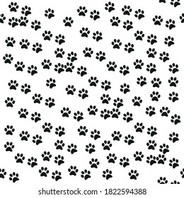 Black and white seamless pattern with paw prints. Abstract background, animal footprint