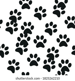Black and white seamless pattern with paw prints. Abstract background, animal footprint