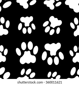 Black and white seamless pattern with paw prints. Abstract background, animal footprint, vector illustration.