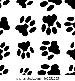 Black and white seamless pattern with paw prints. Abstract background, animal footprint, vector illustration.