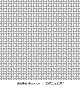Black and white seamless pattern of repeating shapes.