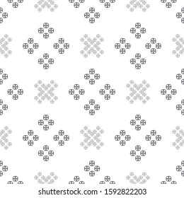 Black and white seamless pattern of repeating shapes.