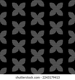 Black and white seamless pattern with repeating elements.