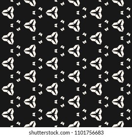 Black and white seamless pattern with simple geometric figures, triangular shapes, small elements. Abstract monochrome background texture, repeat tiles. Modern minimal dark design for decor, covers