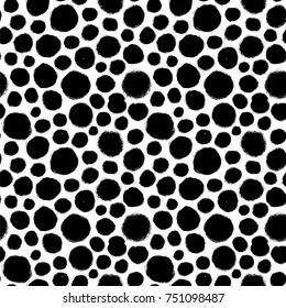 Black and white seamless polka dot seamless pattern. Vector ornament. Ink illustration. Hand drawn ornament for wrapping paper.