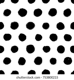 Black and white seamless polka dot seamless pattern. Vector ornament. Ink illustration. Hand drawn ornament for wrapping paper.