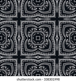 Black and white seamless sketchy doodle pattern, tribal ethnic ornament. Hand drawn abstract background with geometric repeating texture. 