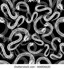 Black and white seamless vector hand drawn pattern with snakes.