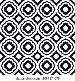 Black and white shapes alternate and create a seamless pattern with black on white and vice versa.