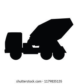 A black and white silhouette of a cement mixer