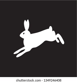 Black and white silhouette of a fluffy rabbit or hare sitting on a white background. Suitable as a logo, icon or design element of your design Projects.