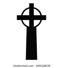A black and white silhouette of a gravestone