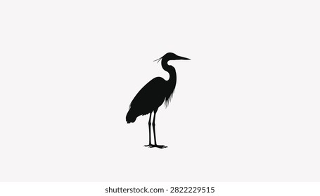 Black and white silhouette of a heron standing on one leg
