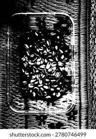 Black and white silhouette vector of garlic fried peanuts in a plastic container on a woven mat. High-contrast illustration featuring traditional Indonesian snack and organic textures.