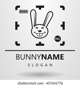 black and white simple flat logo with a smiling bunny
