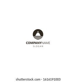 black and white simple negative space vector round logo of a mountain with a snowy peak above the water
