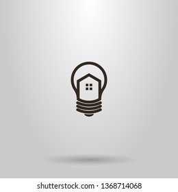 black and white simple vector line art sign of house in a light bulb