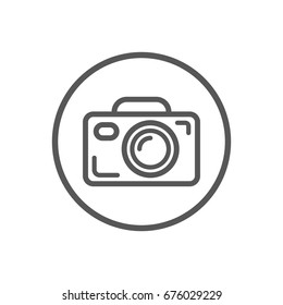 Black and white simple vector line art icon of camera in the round frame