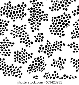 Black and white spots. Abstract seamless vector pattern.