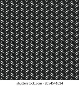 Black and white striped pattern, made of dots, dashes and other signs. Floor carpet texture.