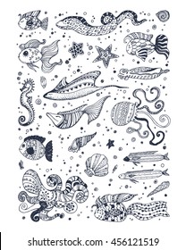 Black and white stylized sea life for coloring book page. Doodle ethnic fish, geometrical pattern, seashell, seahorse and starfish set. Sketch collection. Hand drawn vector illustration.