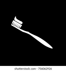 black and white toothbrush on a black background