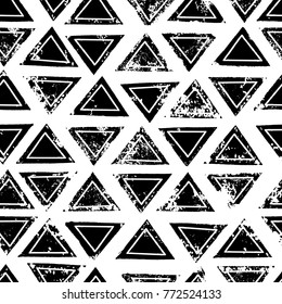 Black and white triangles aged geometric ethnic grunge seamless pattern, vector