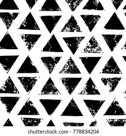 Black and white triangles aged geometric ethnic grunge seamless pattern, vector