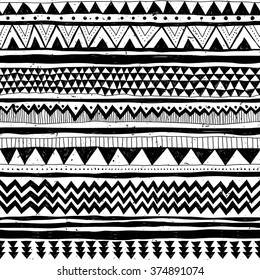 black and white tribal Navajo vector seamless pattern with doodle triangles. aztec abstract geometric print. ethnic hipster backdrop. Wallpaper, cloth design, fabric, paper, cover, textile. Hand drawn