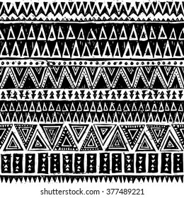 black and white tribal Navajo vector seamless pattern with doodle triangles. aztec abstract geometric print. ethnic hipster backdrop. Wallpaper, cloth design, fabric, paper, cover, textile. Hand drawn