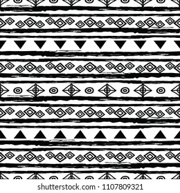 Black and white tribal seamless repeat pattern. Great for folk modern wallpaper, backgrounds, invitations, packaging design projects. Surface pattern design.