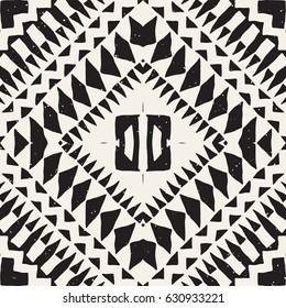 Black and white tribal vector seamless pattern with doodle elements. Aztec abstract geometric art print. Ethnic ornamental hand drawn backdrop.