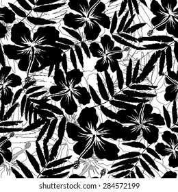 Black and white tropical flowers silhouettes vector seamless pattern