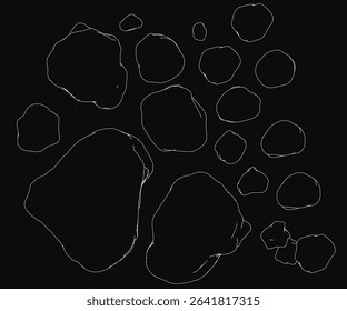 A black and white of various stones forms an intricate design on a dark background. The unique arrangement features different shapes and sizes, creating an artistic and symbolic.