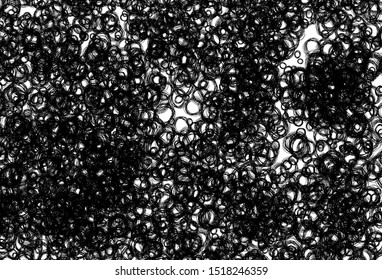 Black and white vector background with spots. Blurred decorative design in abstract style with bubbles. Design for poster, banner of websites.