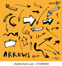 Black and white vector hand-painted brush stroke arrows collection on yellow background